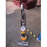 A Dyson DC25 upright vacuum cleaner