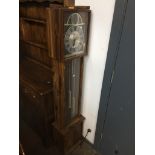 An Alaron quartz long case clock