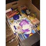 A box of mainly playing cards, etc.
