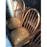 A collection of fourteen chairs including spindle back, and three sets of four oak 1930s/40s,