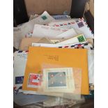 A box of envelopes, first day covers etc