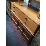 A Nathan teak sideboard with two drawers above cupboard on solid base, H74cm W102cm, together with a