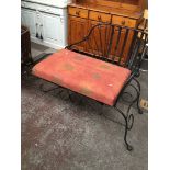 A metal framed modern chaise