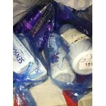 A bag of personal hygiene items, shampoo, toothpaste, etc