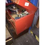 A wooden box of tools, hammers, etc, and a multidrawer metal cabinet with tools.