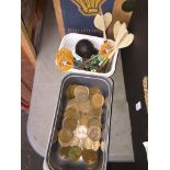 A collection of copper coins and small box of marbles and darts