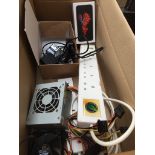 A box of electrical bits, PC fan, 2 multisocket gang plug, empty Iphone 6 case, Sony digital camera,