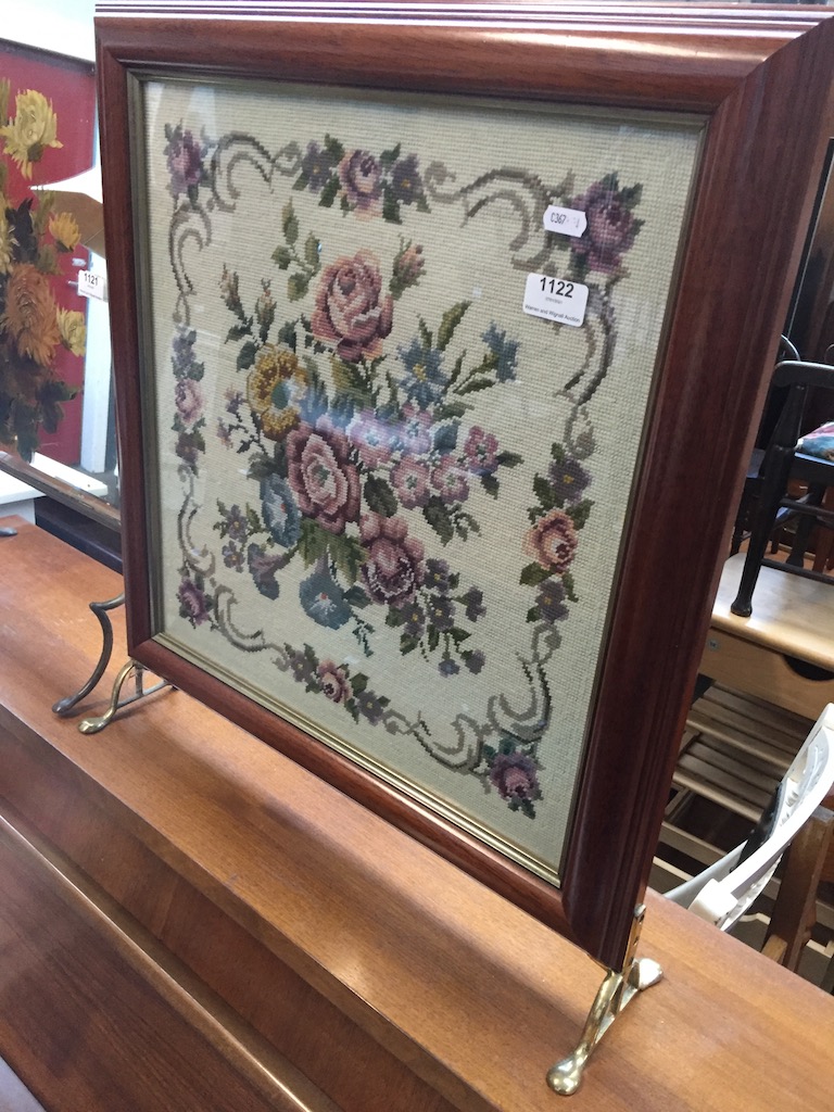 A woven picture fire screen