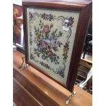 A woven picture fire screen