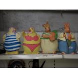 Four papier mache animal jars