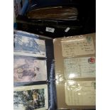 A box containing 5 binders of vintage postcards