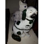 19th century Staffordshire pot dog and a reproduction one