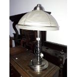 A modern steel and glass table lamp, height 50cm.