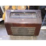 A vintage KB wood veneer cased radio