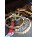 A box of vintage tennis rackets