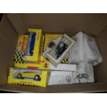 A box of boxed model cars including Maesto
