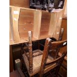 A pair of bergere chairs and pine wall mounting shelves