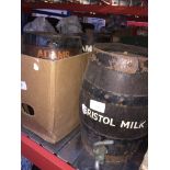 A box of 3 small wooden barrels and 2 glass demijohns