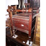 An Edwardian stained beech piano stool, length 53cm.