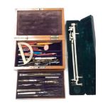Mahogany boxed draughtmans set and another boxed instrument