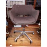 A retro swivel office chair labelled Project Office Furt.