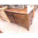 An elm ercol sideboard