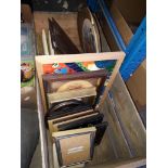 A wooden crate of pictures