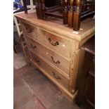 A pine chest of drawers