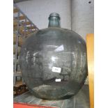 A large glass carboy