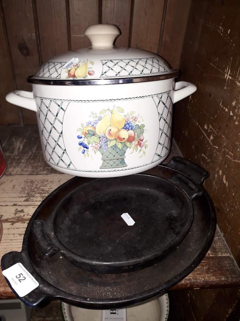 A metal cooking pot and 2 cast metal skillets