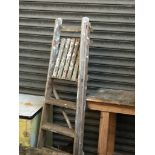 A set of wooden step ladders