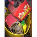 A plastic bucket containing electric hedge trimmer, inspection light, loppers, Bosch charging dock