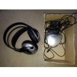 A set of Panasonic stereo headphones with chargng dock