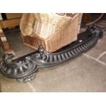 A Rococo sryle cast iron fender, length 139cm, depth 35cm.