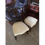 A pair of nursing chairs