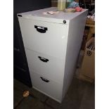 A Triumph metal three drawer filing cabinet