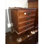 An Edwardian mahogany music cabinet, height 59cm.