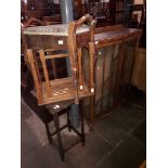 An Art Deco walnut display cabinet, a piano stool, an occasional table and a 2/3 nest of tables.