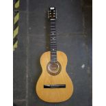 An Encore ENC36N nylon strung acoustic guitar with soft case.