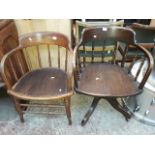 Two spindle back oak captains chairs, one swivel