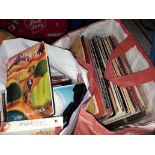 A bag of LPs and a bag of CDs