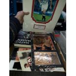 A box of sporting pictures and books