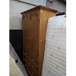 A large pine wardrobe