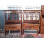 A pair of good quality Edwardian inlaid mahogany single beds, labelled James Parkinson Liverpool,