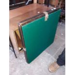 A baize top folding card table