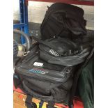 2 motorcycle panniers and a lock bag