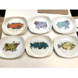 Six vintage Ironstone plates each with a stylised animal.
