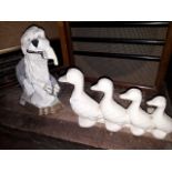 2 cast iron doorstops,( 1 dulux dog and 1 ducks)