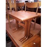 A G-Plan teak nest of tables.