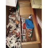 A box of mainly Britains plastic farmyard animals and wooden buildings